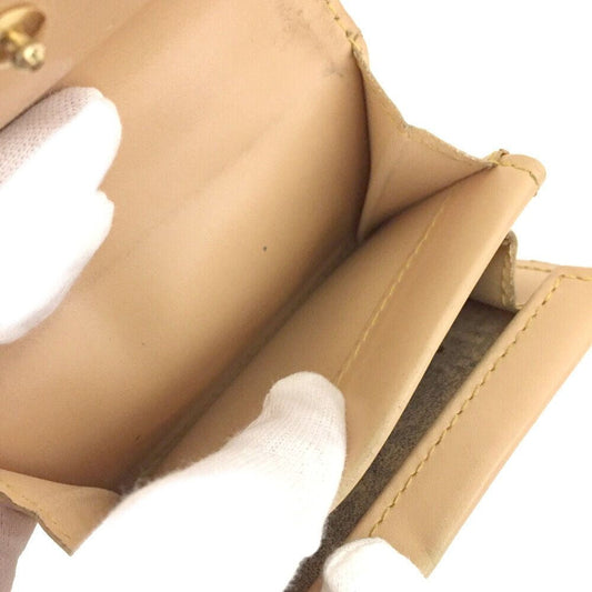 Vintage Louis Vuitton petite wallet with multi color logo print on white leather & lots of card slots