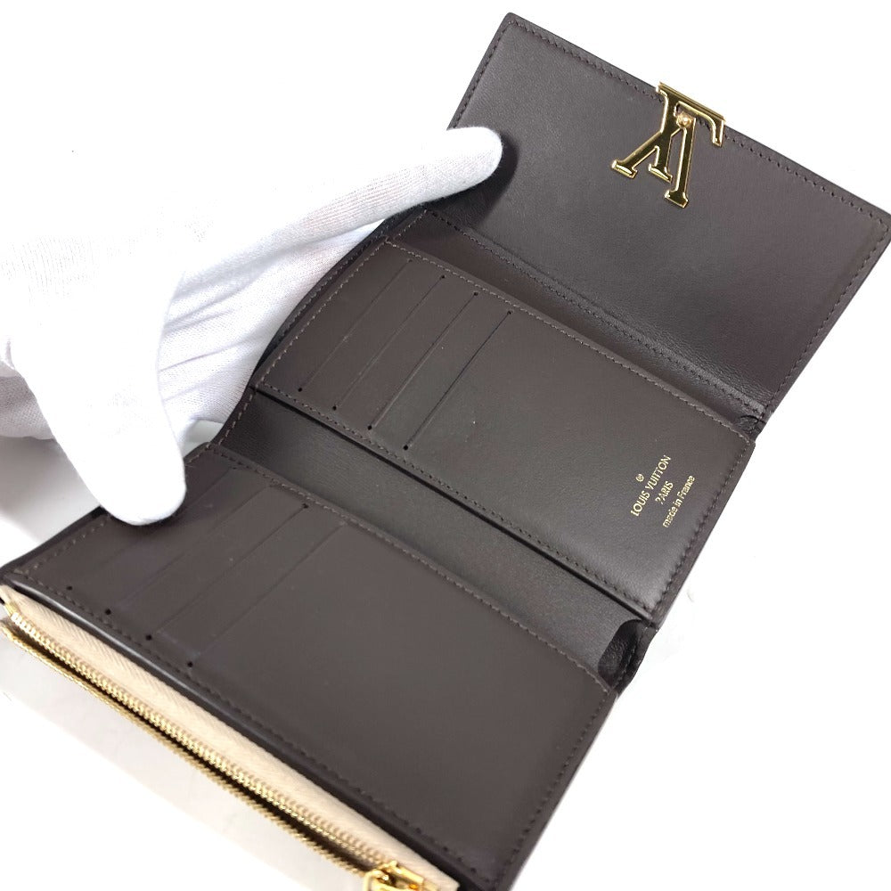 LOUIS VUITTON Trifold wallet M62159 Taurillon Clemence Leather beige Portefeuille Compact Women Used